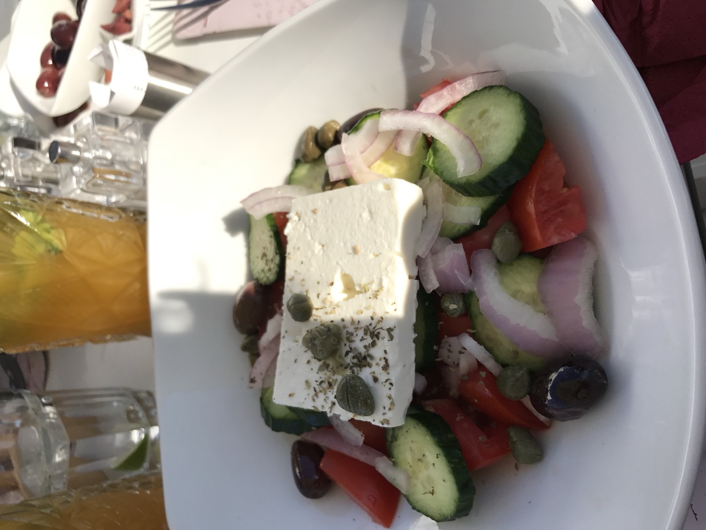 Greek salad on a white dish in Thira